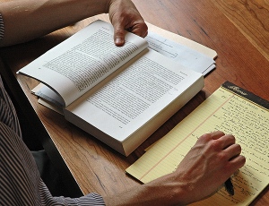 student conducting clearing research